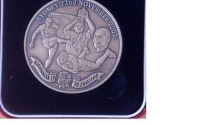 2003 England Rugby World Cup commemorative medal in nice red presentation box. his unique Limited Edition memento has been...