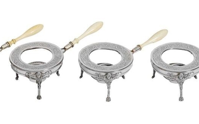1-Suite of four silver stoves with chiselled decoration of foliage...