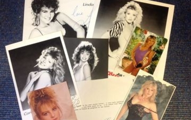 Assorted signed glamour collection. Seven signed items mainly photos. Some of names included are Linda Lusardi, Corinne Russell,...