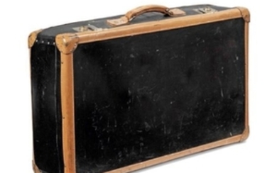 A BLACK LACQUERED CARDBOARD SUITCASE, 1940S