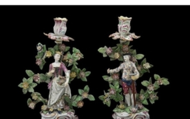 A pair of Bow figural candlesticks of a gardener and companion