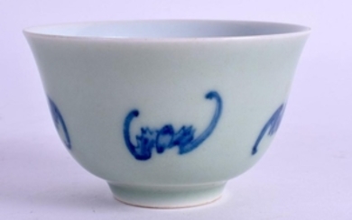 A CHINESE BLUE AND WHITE CELADON TEABOWL painted with