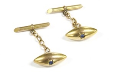 A pair of Edwardian gold single stone sapphire torpedo chain links
