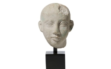 AN EGYPTIAN STONE HEAD Late Period, Circa 664...