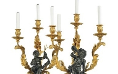 A PAIR OF FRENCH ORMOLU AND PATINATED-BRONZE THREE-LIGHT CANDELABRA, BY MAISON MILLET, PARIS, CIRCA 1900