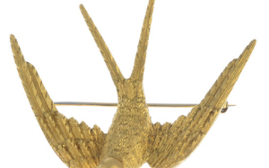 GARRARD & CO. - a 1970s 18ct gold ruby swallow brooch.