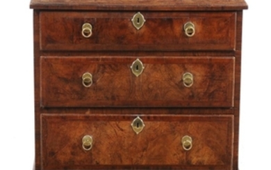 A George II walnut and featherbanded chest of drawers