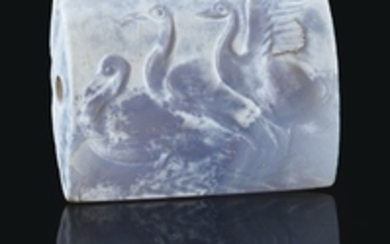 A MINOAN BLUE CHALCEDONY TABLOID SEAL WITH THREE SWANS, LATE PALACE PERIOD, CIRCA 16TH CENTURY B.C.