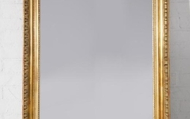 A Neoclassical style carved giltwood mirror
