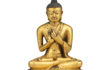 A rare gilt copper-alloy figure of Shakyamuni Buddha