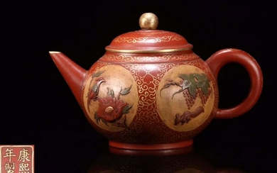 A RED MUD ZISHA POT WITH FLOWER PATTERN