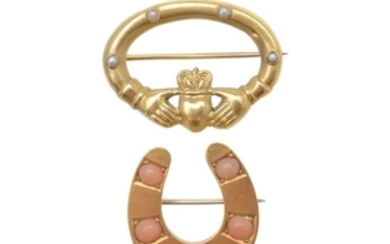 A Victorian coral horseshoe brooch