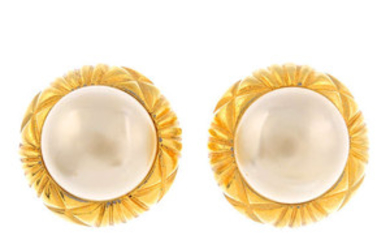 CHANEL - a pair of clip-on earrings. View more details