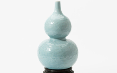 A Chinese blue-grey-glazed double-gourd 'bats' vase