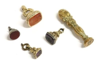 A collection of assorted seals, to include a large gold cased Cornelian intaglio seal, two gold ...