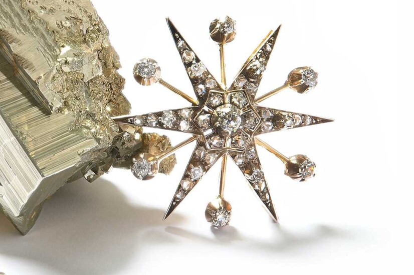 A diamond star brooch, circa 1890 The six ray...