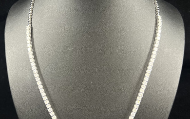 14K White Gold, 4.67ct TDW Diamond, Riviera Necklace. The design...