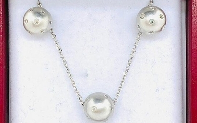 14k white gold diamond ball set earrings and pendant on