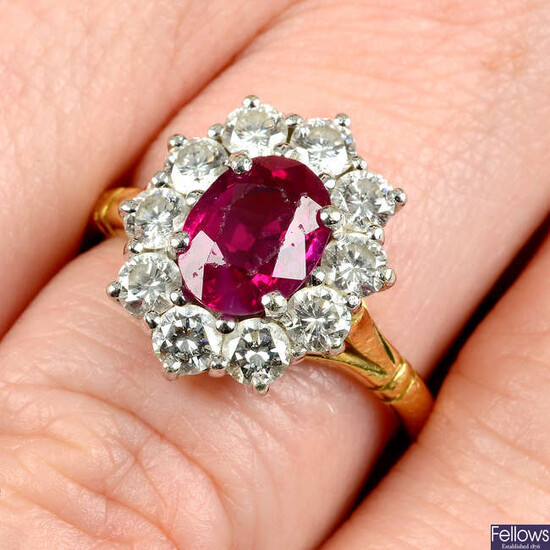 An 18ct gold Burmese ruby and diamond cluster ring.