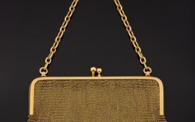 18k (750 thousandths) yellow gold bag with two sapphire cabochons...