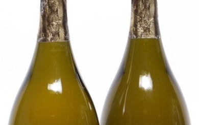 2 bts. Champagne Dom Pérignon, Moët et Chandon 2003 A (hf/in).