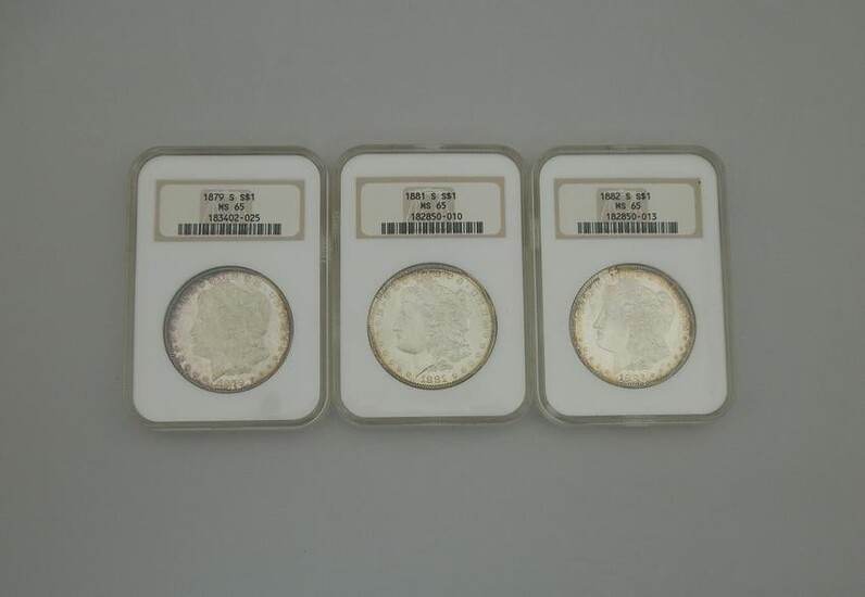 (3) Morgan Silver Dollars. NGC MS-65.