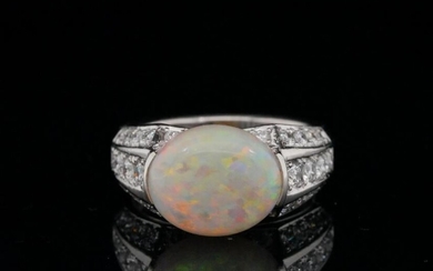 3.50ct Opal, 0.85ctw Diamond and Platinum Ring