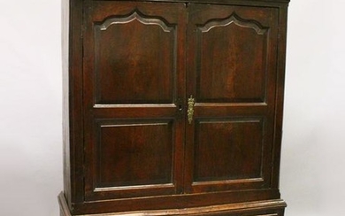 AN 18TH CENTURY OAK BACON CUPBOARD, with a moulded