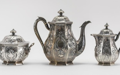 BALL, TOMPKINS & BLACK THREE-PIECE COIN SILVER TEA SET Consists of a teapot, a covered sugar bowl and a covered creamer. Paneled sid...