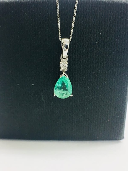 9CT White Gold Emerald and Diamond pendant