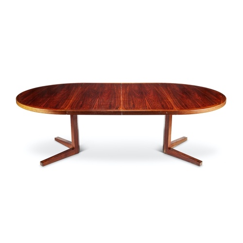 A 1960's rosewood and crossbanded extending dining table by ...