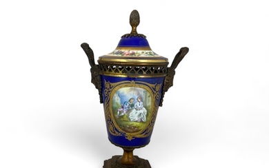 A 19th century Sèvres style porcelain and gilt bronze...