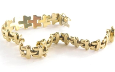A 9ct gold bracelet, with table links and slide...