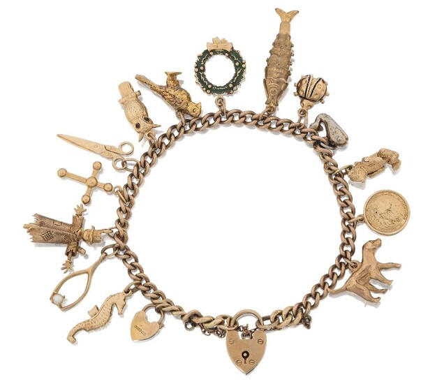 A 9ct gold charm bracelet, the curb link bracelet suspending fourteen charms including an owl, an articulated fish, a dog and a scarecrow, approx. length 18cm, gross weight approx. 41.1g