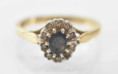 A 9ct yellow gold sapphire and diamond set ring, the...