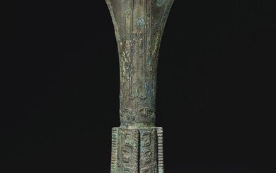 A BRONZE RITUAL WINE VESSEL, GU, LATE SHANG DYNASTY, 12TH-11TH CENTURY BC