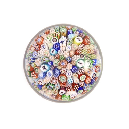 A Baccarat close packed millefiori glass paperweight, dated ...