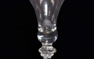 A Baluster Wine Glass, circa 1740, the bell shaped bowl...