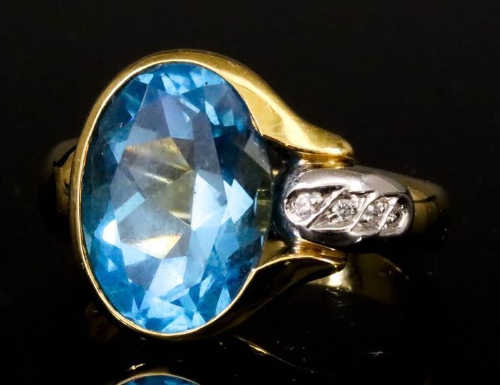 A Blue Topaz and Diamond Ring, Modern, in 18ct...