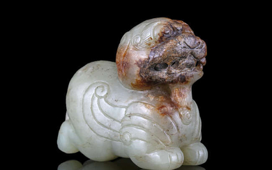 A CELADON AND RUSSETS MYTHICAL WINGED BEAST China,...