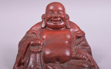 A CHINESE RED LACQUERED FIGURE OF BUDDHA, base 14.5cm