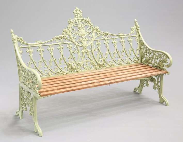 A COALBROOKDALE STYLE GREEN PAINTED GARDEN BENCH, cast