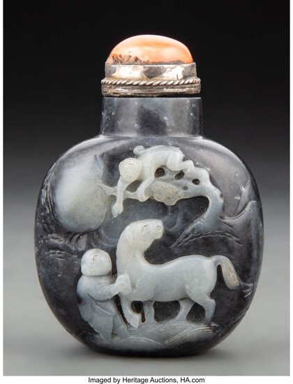 A Chinese Carved Black and White Jade Snuff Bott