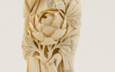 A Chinese Carved Ivory Figurine of a Lady Holding a Peony
