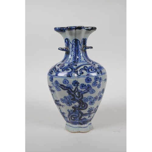 A Chinese blue and white porcelain two handled vase, the top...