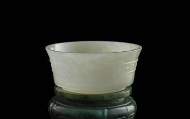 A Chinese carved white jade washer with 'Taotie' motif, 18th century