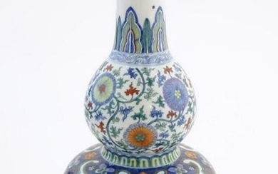 A Chinese double gourd vase with doucai style