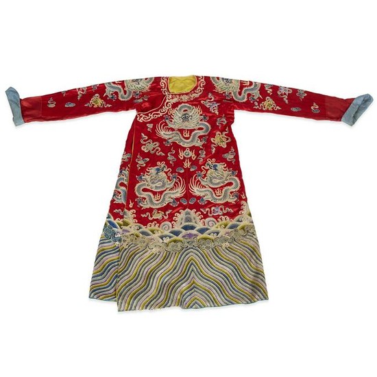 A Chinese embroidered red silk dragon robe, Qing