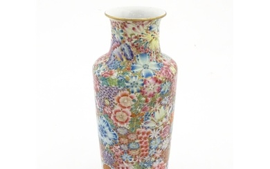 A Chinese famille rose vase decorated with a profusion of fl...