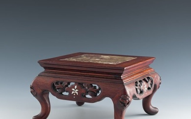 A Chinese hardwood stand with marble insert, Qing dynasty